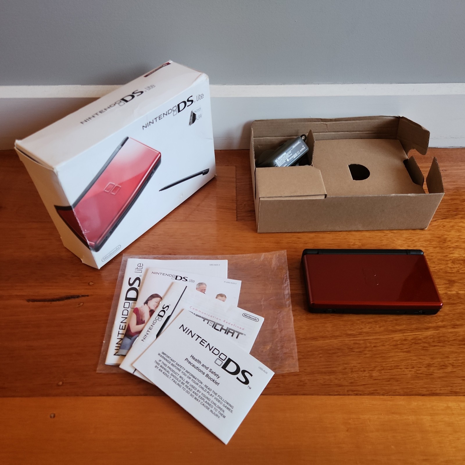 Nintendo DS Lite Red/Black boxed /w insert, manuals and accessories – Aust model