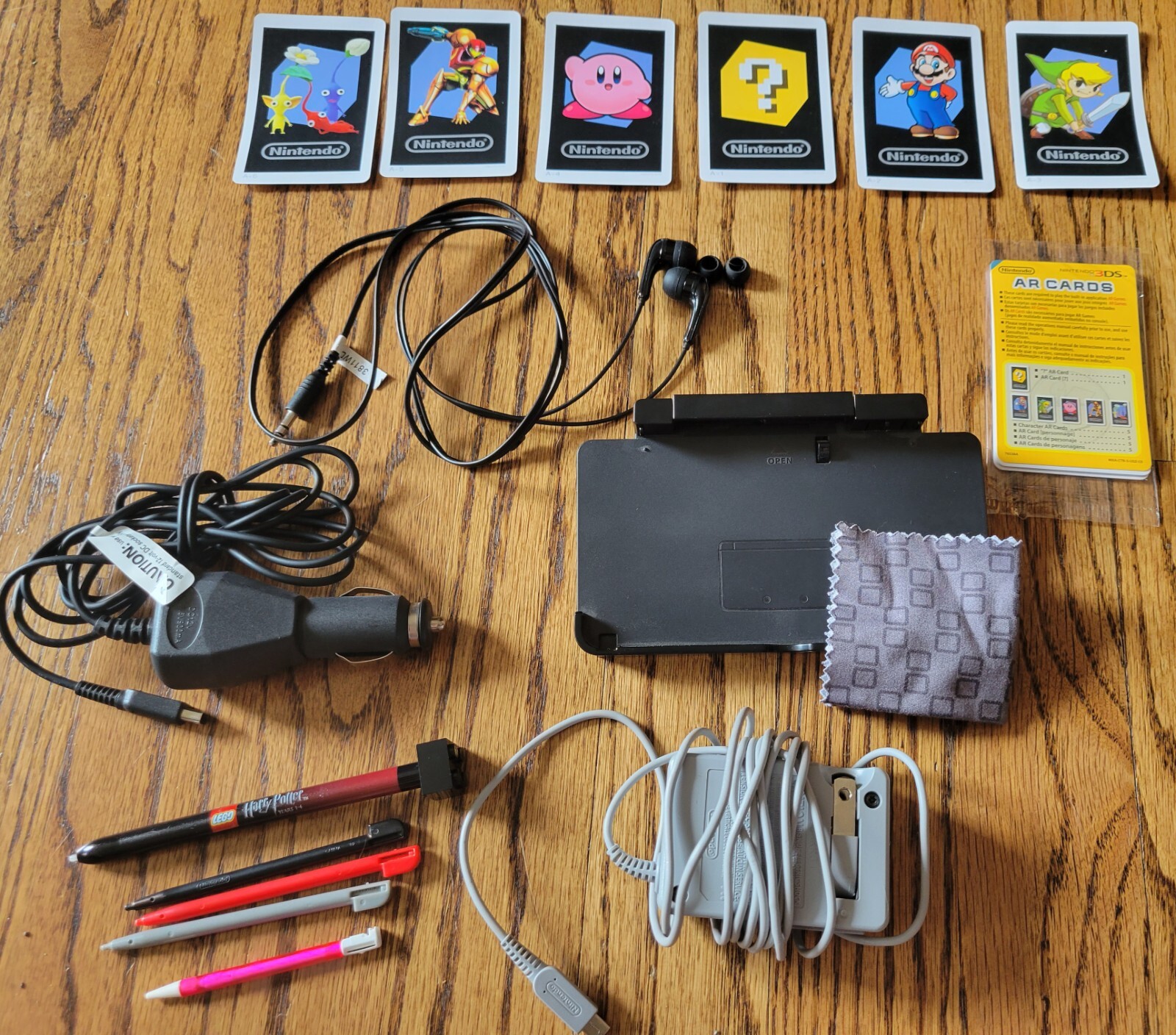 Nintendo 2DS XL Black/Turquoise Console, Accessories, and Games Set